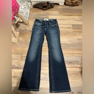 Ariat white stiched jeans